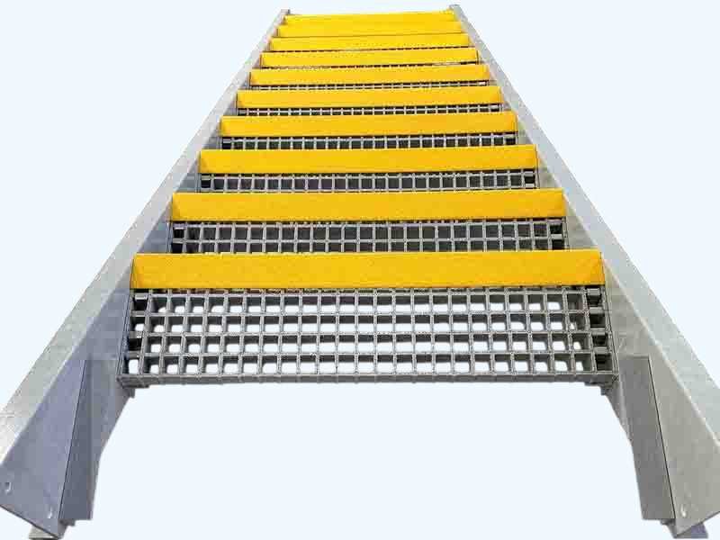FRP stair tread with molded grit‑top walking surface and pre‑drilled mounting holes manufactured by WayTong Building Materials