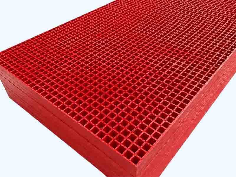 Fire‑rated phenolic FRP grating panel with the characteristic dark resin colour, produced by WayTong Building Materials